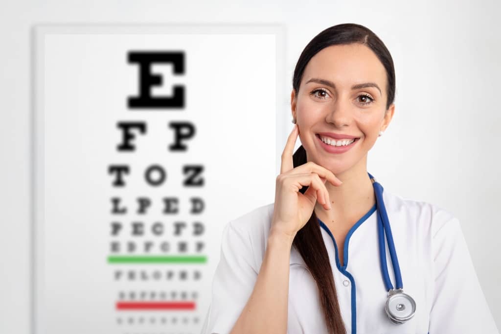 A smiling lady eye doctor