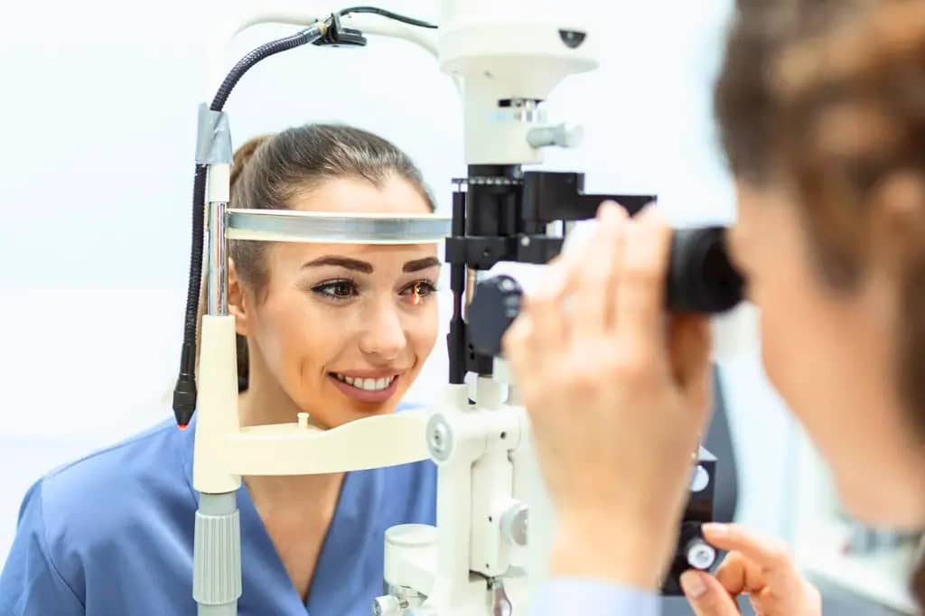 Patient undergoing a visual field test to assess peripheral vision.